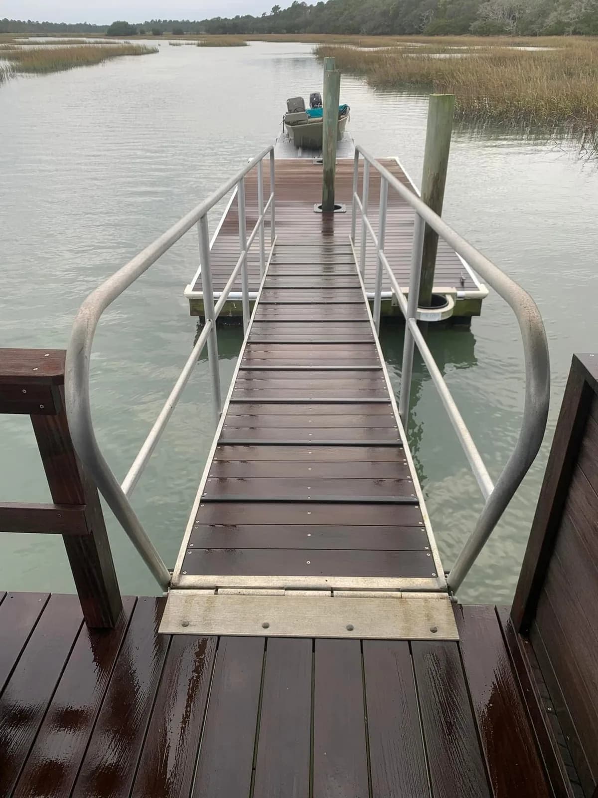 Kiawah Island dock gangway wood restored to warm brown after professional cleaning
