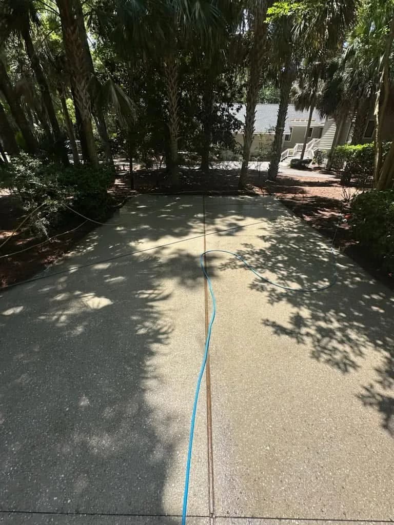 Exposed aggregate driveway bright and even after surface cleaning