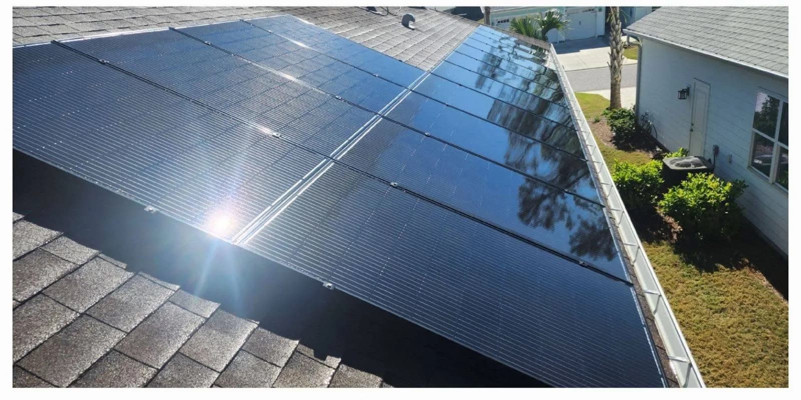 Rooftop solar panels spotless and reflective after professional cleaning