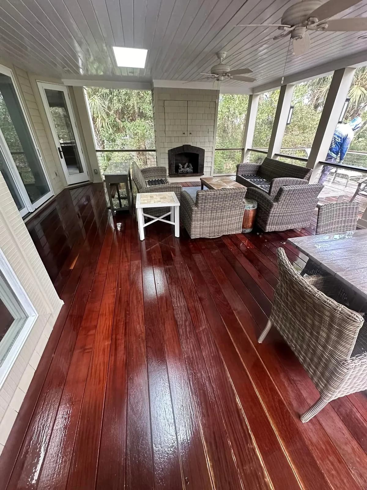 Screened porch IPE floor restored to rich color after cleaning and brightening