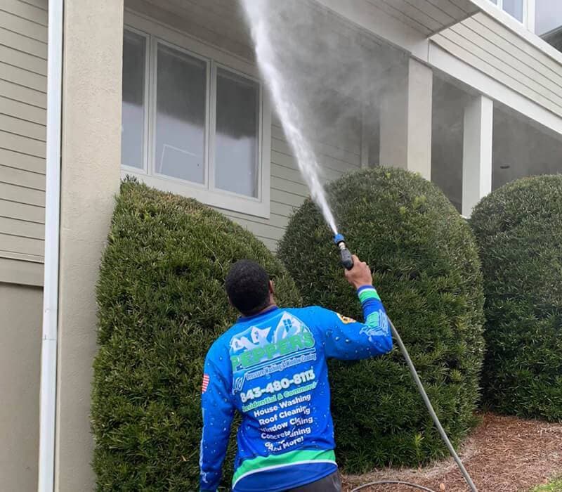 Pressure washing a Cassique, SC home