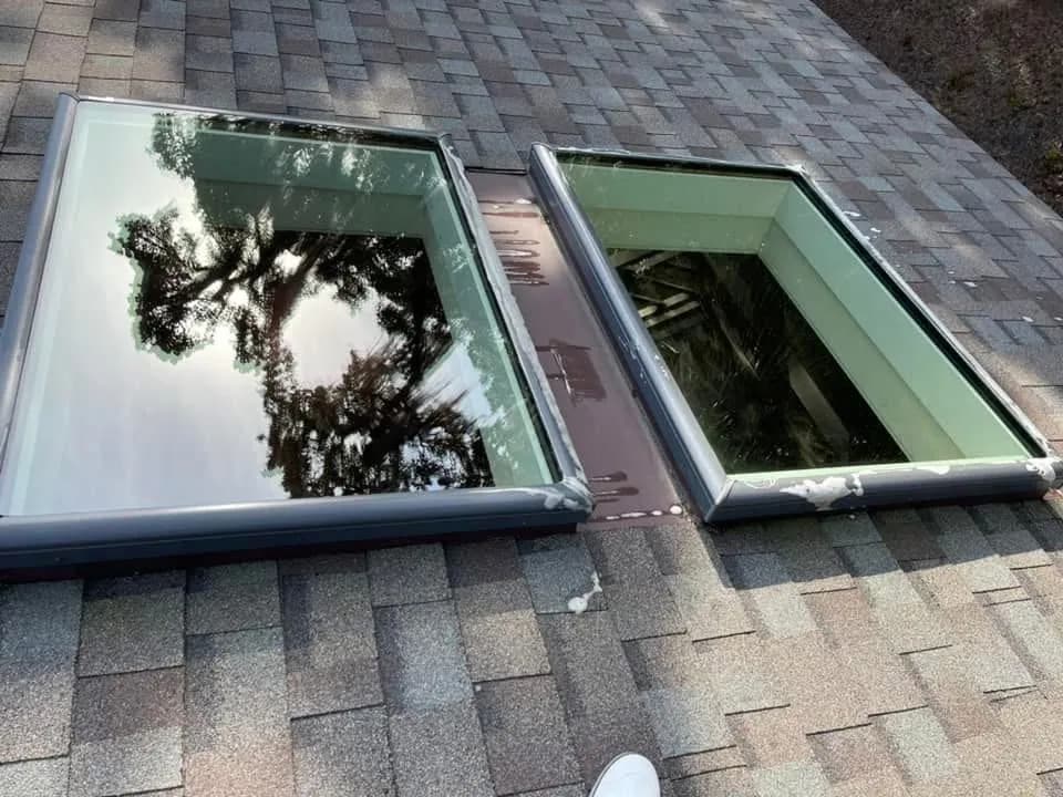 Clean skylights with crystal-clear glass and blue sky visible through the panes — Charleston, SC professional skylight cleaning